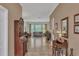 Bright and airy living room featuring neutral decor, tiled floors, and large windows that provide natural light at 5171 51St W Ln, Bradenton, FL 34210