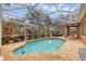 Enclosed pool area with a pool, patio, and landscaping at 5171 51St W Ln, Bradenton, FL 34210