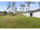 Spacious backyard with grassy area and privacy at 5270 Adina Cir, North Port, FL 34291