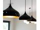 Close-up of modern black pendant lights at 5270 Adina Cir, North Port, FL 34291