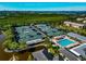 Aerial view of tennis courts and pool at 5450 Eagles Point Cir # 301, Sarasota, FL 34231