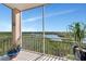 Enjoy breathtaking water views from this screened balcony at 5450 Eagles Point Cir # 301, Sarasota, FL 34231