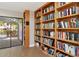 Well-stocked community bookshelf at 5450 Eagles Point Cir # 301, Sarasota, FL 34231