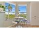 Cozy breakfast nook with a view and seating for two at 5450 Eagles Point Cir # 301, Sarasota, FL 34231