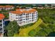 Building exterior with landscaped grounds at 5450 Eagles Point Cir # 301, Sarasota, FL 34231