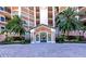 Appealing condo building with a grand entrance and manicured landscaping at 5450 Eagles Point Cir # 301, Sarasota, FL 34231