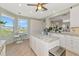 Bright kitchen featuring an island and ample cabinet space at 5450 Eagles Point Cir # 301, Sarasota, FL 34231