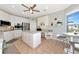 Modern white kitchen with stainless steel appliances at 5450 Eagles Point Cir # 301, Sarasota, FL 34231