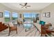 Comfortable living room with water views and plenty of natural light at 5450 Eagles Point Cir # 301, Sarasota, FL 34231