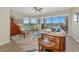 Relaxing living area with water views, comfortable seating and large windows at 5450 Eagles Point Cir # 301, Sarasota, FL 34231