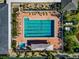 Community pool and hot tub from above at 5450 Eagles Point Cir # 301, Sarasota, FL 34231