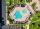 Aerial view of community pool and surrounding areas at 5855 Midnight Pass Rd # 520, Sarasota, FL 34242