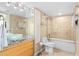 Bathroom with a shower/tub combo and granite vanity at 5855 Midnight Pass Rd # 520, Sarasota, FL 34242