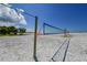 Beach volleyball net on a pristine, sandy beach at 5855 Midnight Pass Rd # 520, Sarasota, FL 34242