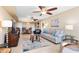 Living room with dining area and water views at 5855 Midnight Pass Rd # 520, Sarasota, FL 34242