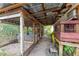 Rustic chicken coop with several cages and a covered area at 6307 30Th E Ave, Palmetto, FL 34221