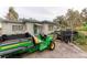 Home exterior with John Deere utility vehicle at 6307 30Th E Ave, Palmetto, FL 34221