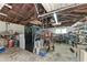 Large garage with high ceilings and various items at 6307 30Th E Ave, Palmetto, FL 34221