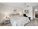 Bright bedroom with a queen-size bed and built-in closet at 712 Bird Bay Dr # 146, Venice, FL 34285