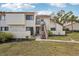 Condo building with stairs leading to individual unit entrances at 712 Bird Bay Dr # 146, Venice, FL 34285