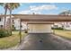 Covered carport parking with additional storage at 712 Bird Bay Dr # 146, Venice, FL 34285