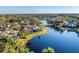 Aerial view of the community, highlighting waterfront property at 7220 Kensington Ct, University Park, FL 34201