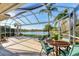 Enjoy this screened patio with lake views! at 7220 Kensington Ct, University Park, FL 34201