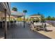 Wide angle shot of a spacious deck with an outdoor bar, tables, chairs and a gazebo at 73 Tidy Island Blvd, Bradenton, FL 34210