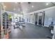 Spacious gym featuring modern equipment and ample natural light, providing a great space for fitness activities at 73 Tidy Island Blvd, Bradenton, FL 34210