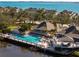 Community pool offers waterfront views and lounging areas for relaxation at 73 Tidy Island Blvd, Bradenton, FL 34210