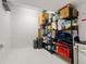 Storage room with organized shelving, boxes, and personal items at 73 Tidy Island Blvd, Bradenton, FL 34210