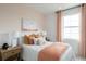 Calm bedroom with blush-toned walls and soft bedding at 7350 Marathon Dr, Seminole, FL 33777