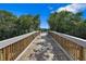 Wooden boardwalk leading to the water at 7350 Marathon Dr, Seminole, FL 33777