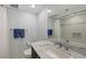 Clean bathroom with a single vanity and shower/tub combo at 775 Longboat Club Rd # 304, Longboat Key, FL 34228