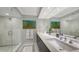 Modern bathroom with double vanity, large shower, and marble finishes at 775 Longboat Club Rd # 304, Longboat Key, FL 34228