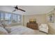 Bright bedroom featuring a comfortable bed and ocean views at 775 Longboat Club Rd # 304, Longboat Key, FL 34228