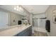 Elegant bathroom with a shower/tub combo and modern vanity at 7872 Mainsail Ln, Sarasota, FL 34240