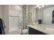 Clean bathroom with shower/tub combo, vanity, and modern fixtures at 7872 Mainsail Ln, Sarasota, FL 34240