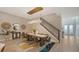 Formal dining room features a large wooden table and a stunning chandelier at 7872 Mainsail Ln, Sarasota, FL 34240