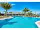 Stunning resort-style pool with clubhouse views at 7872 Mainsail Ln, Sarasota, FL 34240