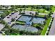 Tennis and pickleball courts in a community setting at 7872 Mainsail Ln, Sarasota, FL 34240