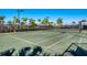 Full-sized tennis court for recreation at 7872 Mainsail Ln, Sarasota, FL 34240