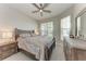 Cozy bedroom with wood furniture, ample natural light and window seating at 8112 Slipway Dr, Sarasota, FL 34240