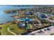 Aerial view of community pool, bocce ball, and clubhouse at 8112 Slipway Dr, Sarasota, FL 34240