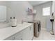 Laundry room with washer, dryer, and folding counter at 8112 Slipway Dr, Sarasota, FL 34240