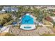 Aerial view of a resort-style pool with surrounding lounge areas at 8112 Slipway Dr, Sarasota, FL 34240