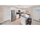 Modern kitchen with stainless steel appliances and granite countertops at 881 Polaris Rd, Venice, FL 34293