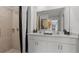 Bathroom boasts a double vanity and a large walk-in shower at 9100 Tequila Sunrise Dr, Sarasota, FL 34241