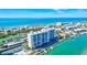 Luxury waterfront building with boat slips and pool at 9393 Midnight Pass Rd # 704, Sarasota, FL 34242