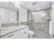 Updated bathroom with granite vanity and walk-in shower at 9393 Midnight Pass Rd # 704, Sarasota, FL 34242